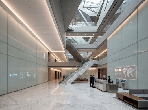 GovTech government technology digital architecture minimalist conceptual photo: modern marble and frosted glass government building interior with subtle architectural lighting, clean minimal enterprise geometric structure